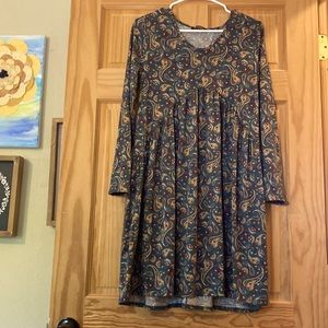 Medium silky dark green dress with lots of design